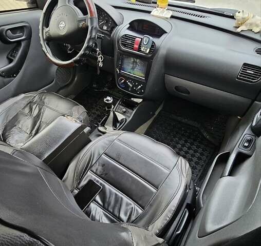 Белый Опель Комбо груз.-пасс., объемом двигателя 1.3 л и пробегом 200 тыс. км за 3100 $, фото 2 на Automoto.ua