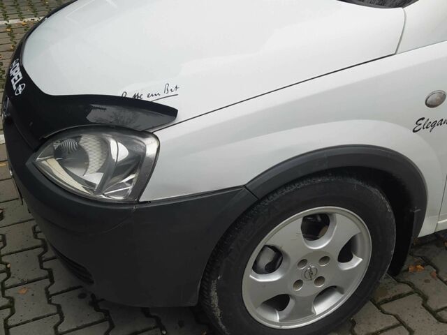 Белый Опель Комбо груз.-пасс., объемом двигателя 1.2 л и пробегом 300 тыс. км за 3950 $, фото 1 на Automoto.ua