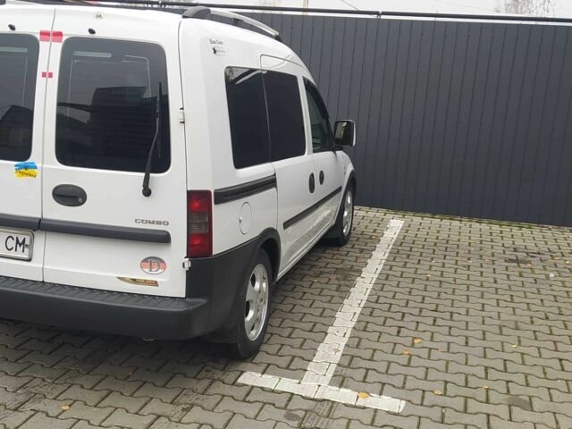 Белый Опель Комбо груз.-пасс., объемом двигателя 1.2 л и пробегом 300 тыс. км за 3950 $, фото 6 на Automoto.ua