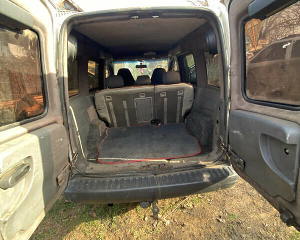 Белый Опель Комбо груз.-пасс., объемом двигателя 1.25 л и пробегом 300 тыс. км за 4000 $, фото 4 на Automoto.ua