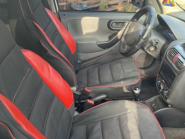 Белый Опель Комбо груз.-пасс., объемом двигателя 1.2 л и пробегом 3 тыс. км за 4200 $, фото 2 на Automoto.ua