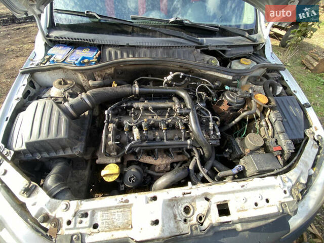 Белый Опель Комбо груз.-пасс., объемом двигателя 1.25 л и пробегом 300 тыс. км за 4000 $, фото 1 на Automoto.ua