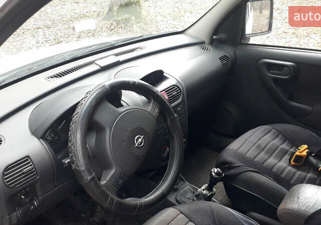 Белый Опель Комбо груз.-пасс., объемом двигателя 1.3 л и пробегом 220 тыс. км за 3800 $, фото 5 на Automoto.ua