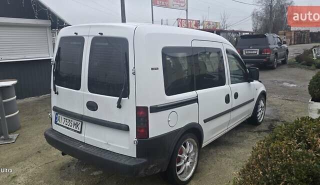 Белый Опель Комбо груз.-пасс., объемом двигателя 1.3 л и пробегом 370 тыс. км за 3650 $, фото 5 на Automoto.ua