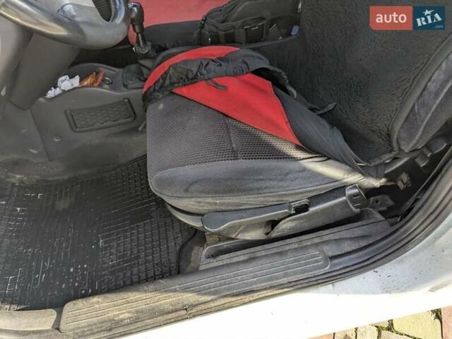 Белый Опель Комбо груз.-пасс., объемом двигателя 1.25 л и пробегом 395 тыс. км за 4000 $, фото 20 на Automoto.ua