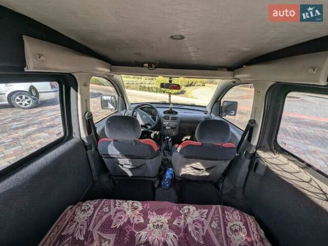 Белый Опель Комбо груз.-пасс., объемом двигателя 1.25 л и пробегом 395 тыс. км за 4000 $, фото 11 на Automoto.ua