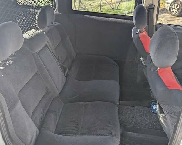 Белый Опель Комбо груз.-пасс., объемом двигателя 1.25 л и пробегом 395 тыс. км за 4000 $, фото 7 на Automoto.ua