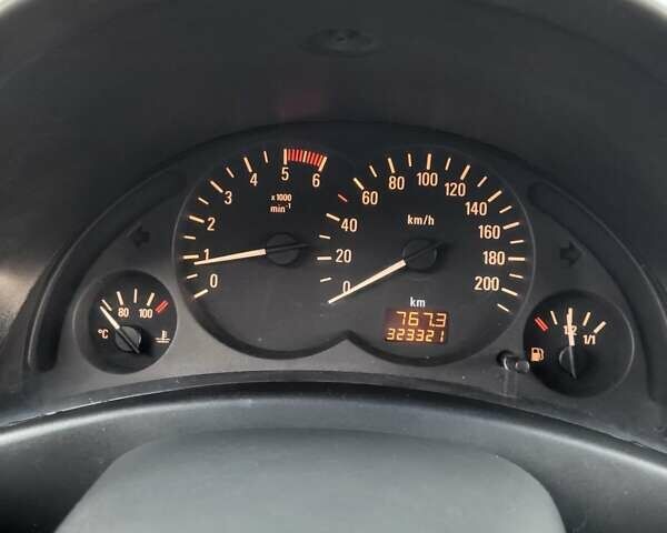 Білий Опель Комбо вант.-пас., об'ємом двигуна 1.3 л та пробігом 323 тис. км за 3750 $, фото 17 на Automoto.ua