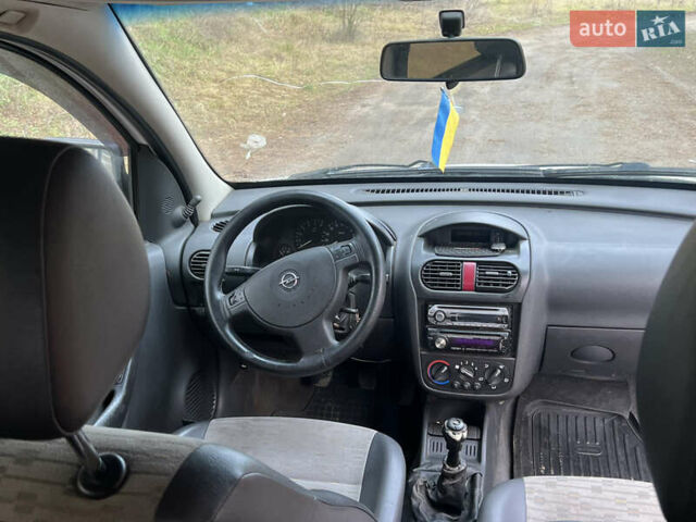 Белый Опель Комбо груз.-пасс., объемом двигателя 1.25 л и пробегом 290 тыс. км за 2900 $, фото 21 на Automoto.ua