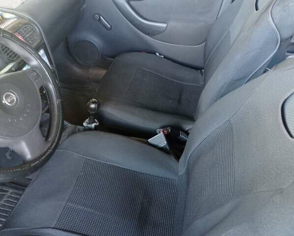 Белый Опель Комбо груз.-пасс., объемом двигателя 1.2 л и пробегом 350 тыс. км за 3800 $, фото 8 на Automoto.ua