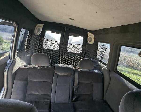 Белый Опель Комбо груз.-пасс., объемом двигателя 1.25 л и пробегом 395 тыс. км за 4000 $, фото 8 на Automoto.ua