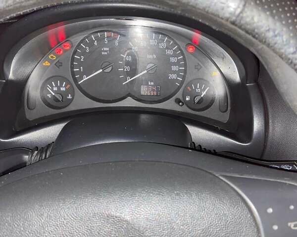 Белый Опель Комбо груз.-пасс., объемом двигателя 1.3 л и пробегом 426 тыс. км за 4200 $, фото 7 на Automoto.ua