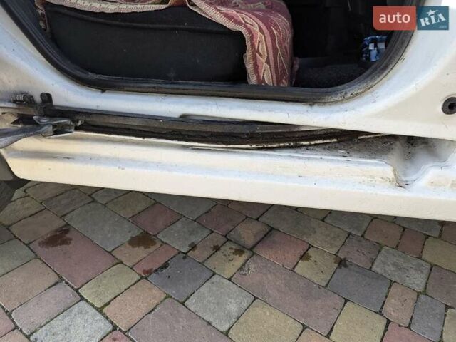 Белый Опель Комбо груз.-пасс., объемом двигателя 1.25 л и пробегом 395 тыс. км за 4000 $, фото 13 на Automoto.ua