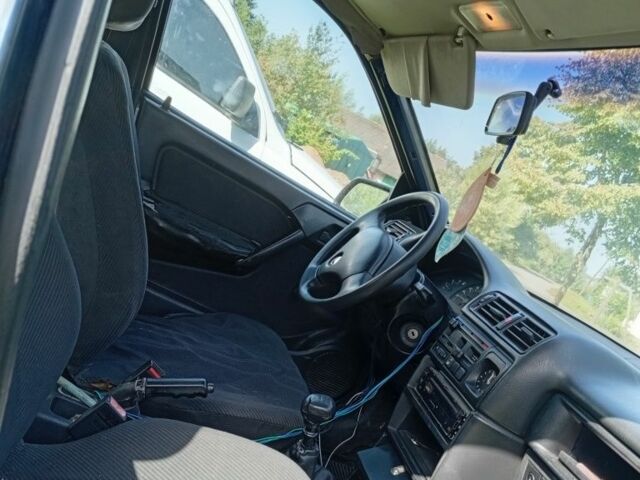 Белый Опель Комбо груз.-пасс., объемом двигателя 1.2 л и пробегом 320 тыс. км за 4500 $, фото 4 на Automoto.ua