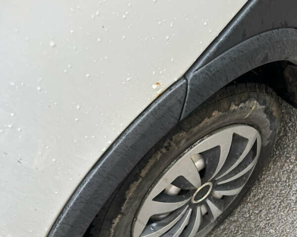 Белый Опель Комбо груз.-пасс., объемом двигателя 1.3 л и пробегом 310 тыс. км за 4100 $, фото 11 на Automoto.ua