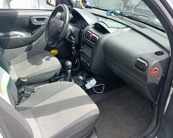 Белый Опель Комбо груз.-пасс., объемом двигателя 1.25 л и пробегом 294 тыс. км за 4000 $, фото 14 на Automoto.ua