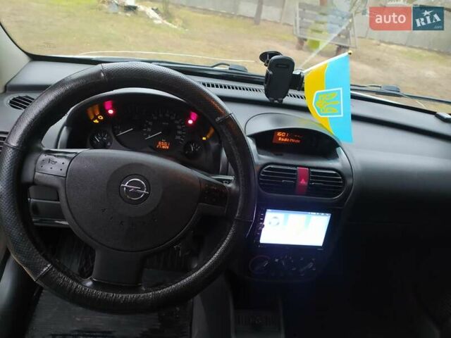 Белый Опель Комбо груз.-пасс., объемом двигателя 1.2 л и пробегом 274 тыс. км за 4200 $, фото 3 на Automoto.ua