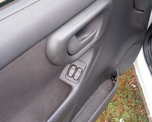 Білий Опель Комбо вант.-пас., об'ємом двигуна 1.2 л та пробігом 325 тис. км за 4150 $, фото 10 на Automoto.ua