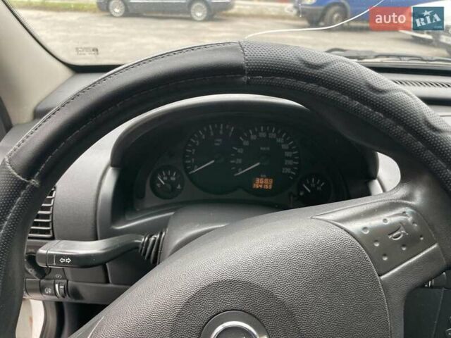 Белый Опель Комбо груз.-пасс., объемом двигателя 1.6 л и пробегом 337 тыс. км за 3000 $, фото 22 на Automoto.ua