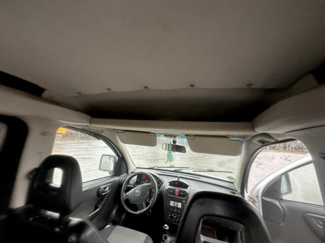 Белый Опель Комбо груз.-пасс., объемом двигателя 1.3 л и пробегом 344 тыс. км за 2700 $, фото 19 на Automoto.ua