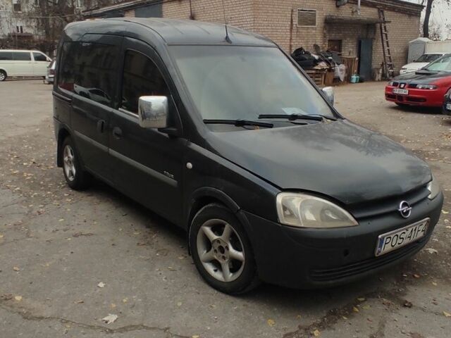 Черный Опель Комбо груз.-пасс., объемом двигателя 1.7 л и пробегом 170 тыс. км за 4000 $, фото 1 на Automoto.ua