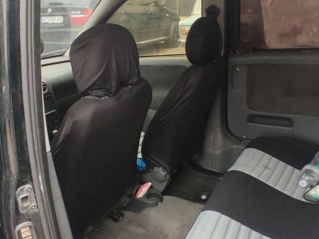 Черный Опель Комбо груз.-пасс., объемом двигателя 1.7 л и пробегом 170 тыс. км за 4000 $, фото 5 на Automoto.ua