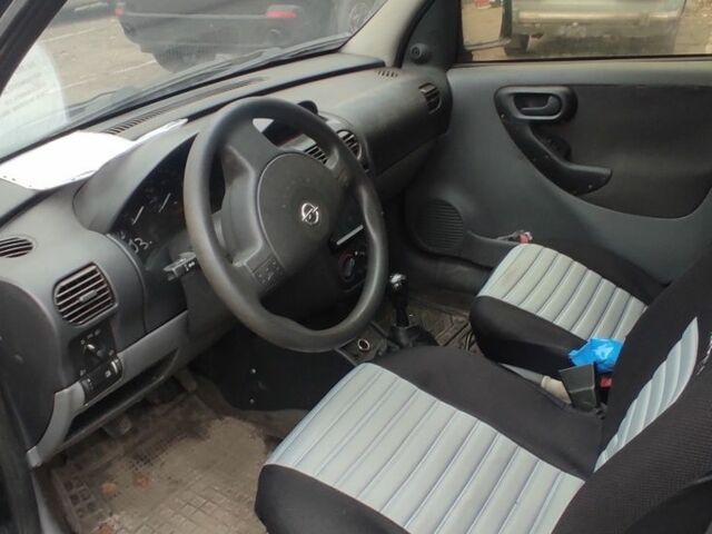 Черный Опель Комбо груз.-пасс., объемом двигателя 1.7 л и пробегом 170 тыс. км за 4000 $, фото 4 на Automoto.ua