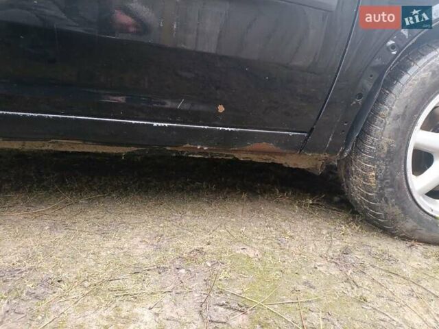 Черный Опель Комбо груз.-пасс., объемом двигателя 1.7 л и пробегом 280 тыс. км за 2800 $, фото 10 на Automoto.ua