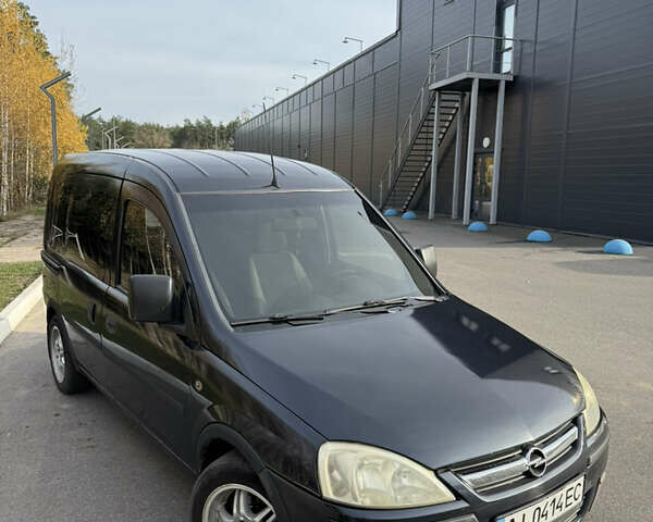Черный Опель Комбо груз.-пасс., объемом двигателя 2 л и пробегом 334 тыс. км за 3500 $, фото 7 на Automoto.ua