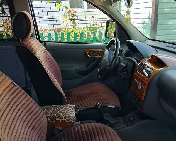 Чорний Опель Комбо вант.-пас., об'ємом двигуна 1.6 л та пробігом 275 тис. км за 3800 $, фото 1 на Automoto.ua