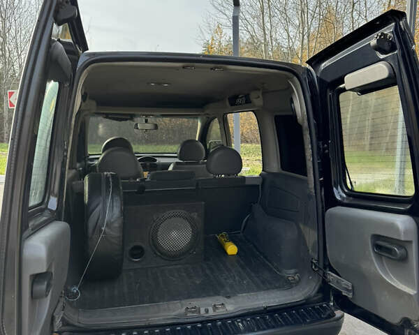 Черный Опель Комбо груз.-пасс., объемом двигателя 2 л и пробегом 334 тыс. км за 3500 $, фото 5 на Automoto.ua