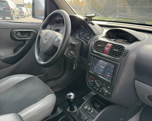 Черный Опель Комбо груз.-пасс., объемом двигателя 2 л и пробегом 334 тыс. км за 3500 $, фото 6 на Automoto.ua