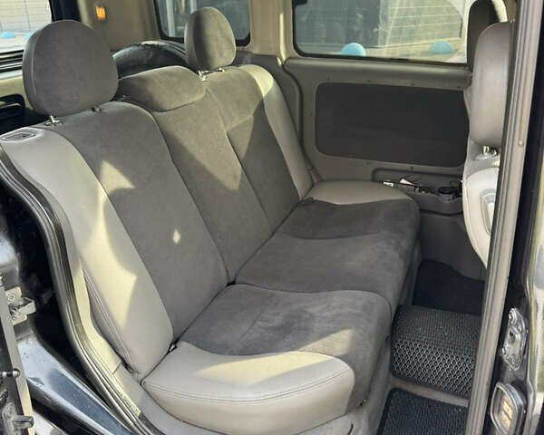 Черный Опель Комбо груз.-пасс., объемом двигателя 2 л и пробегом 334 тыс. км за 3500 $, фото 3 на Automoto.ua