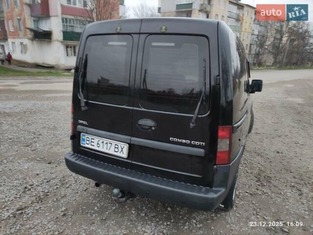 Черный Опель Комбо груз.-пасс., объемом двигателя 1.3 л и пробегом 260 тыс. км за 4000 $, фото 2 на Automoto.ua