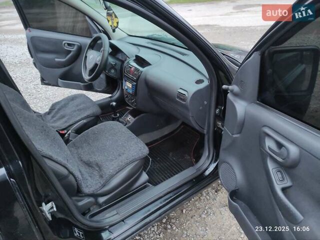 Черный Опель Комбо груз.-пасс., объемом двигателя 1.3 л и пробегом 260 тыс. км за 4000 $, фото 21 на Automoto.ua