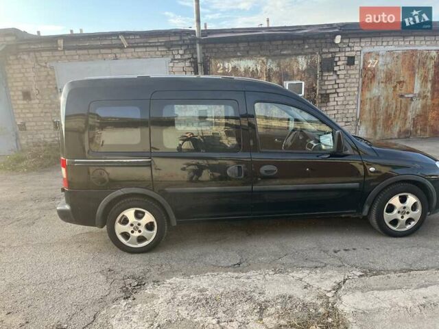 Черный Опель Комбо груз.-пасс., объемом двигателя 1.6 л и пробегом 250 тыс. км за 5000 $, фото 6 на Automoto.ua