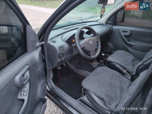 Черный Опель Комбо груз.-пасс., объемом двигателя 1.3 л и пробегом 260 тыс. км за 4000 $, фото 16 на Automoto.ua