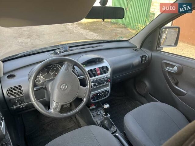 Черный Опель Комбо груз.-пасс., объемом двигателя 1.6 л и пробегом 250 тыс. км за 5000 $, фото 7 на Automoto.ua