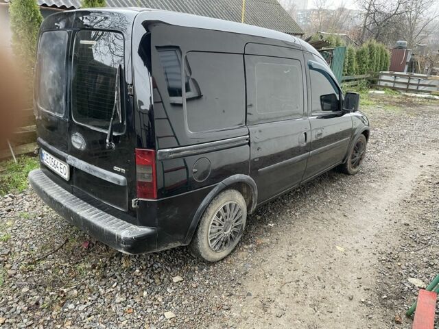 Черный Опель Комбо груз.-пасс., объемом двигателя 1.2 л и пробегом 243 тыс. км за 2500 $, фото 3 на Automoto.ua