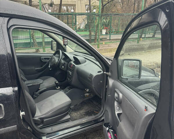 Черный Опель Комбо груз.-пасс., объемом двигателя 1.25 л и пробегом 130 тыс. км за 4200 $, фото 5 на Automoto.ua