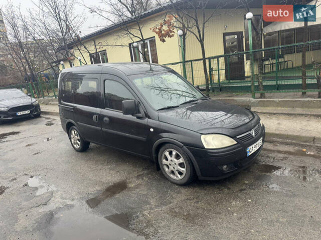 Черный Опель Комбо груз.-пасс., объемом двигателя 1.25 л и пробегом 130 тыс. км за 4200 $, фото 6 на Automoto.ua