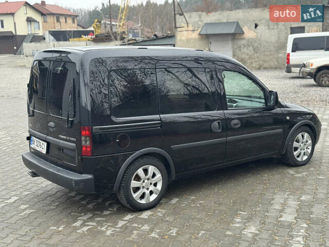 Черный Опель Комбо груз.-пасс., объемом двигателя 1.7 л и пробегом 219 тыс. км за 4999 $, фото 21 на Automoto.ua