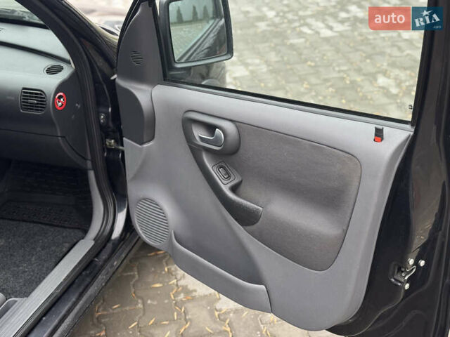 Черный Опель Комбо груз.-пасс., объемом двигателя 1.7 л и пробегом 219 тыс. км за 4999 $, фото 33 на Automoto.ua