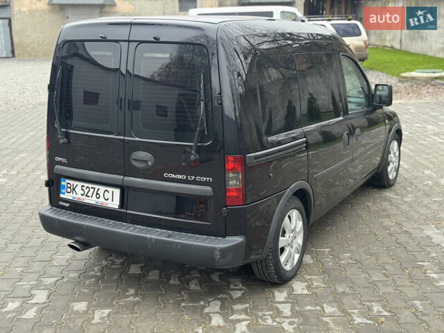 Черный Опель Комбо груз.-пасс., объемом двигателя 1.7 л и пробегом 219 тыс. км за 4999 $, фото 24 на Automoto.ua