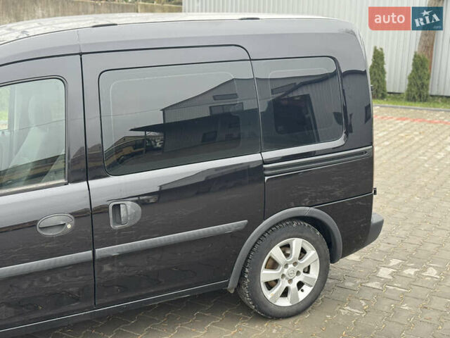 Черный Опель Комбо груз.-пасс., объемом двигателя 1.7 л и пробегом 219 тыс. км за 4999 $, фото 28 на Automoto.ua