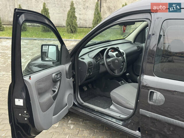 Черный Опель Комбо груз.-пасс., объемом двигателя 1.7 л и пробегом 219 тыс. км за 4999 $, фото 16 на Automoto.ua