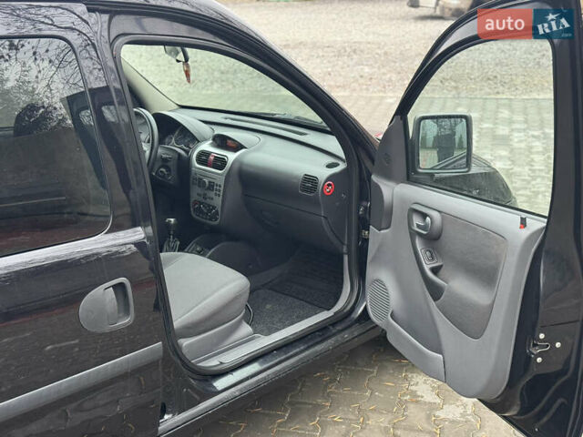 Черный Опель Комбо груз.-пасс., объемом двигателя 1.7 л и пробегом 219 тыс. км за 4999 $, фото 7 на Automoto.ua