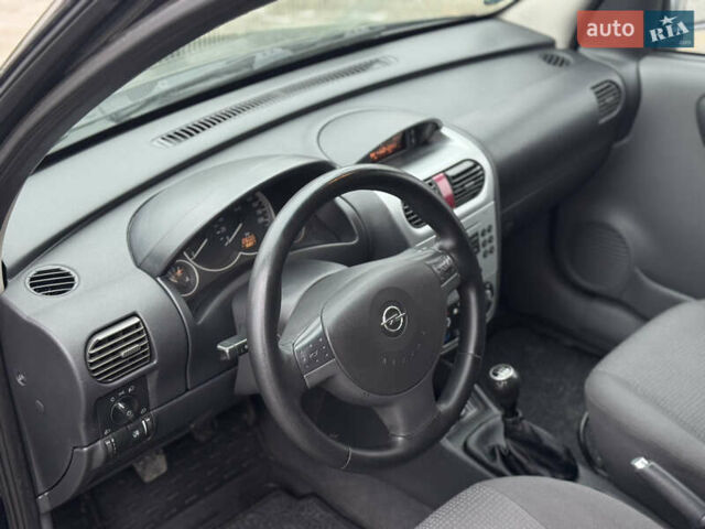 Черный Опель Комбо груз.-пасс., объемом двигателя 1.7 л и пробегом 219 тыс. км за 4999 $, фото 34 на Automoto.ua