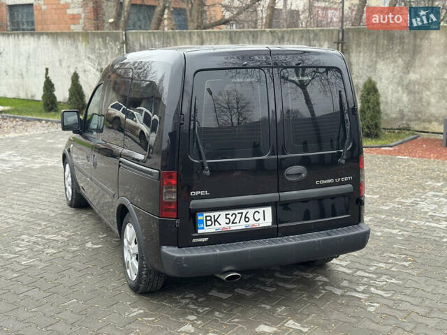 Черный Опель Комбо груз.-пасс., объемом двигателя 1.7 л и пробегом 219 тыс. км за 4999 $, фото 26 на Automoto.ua