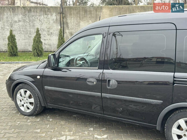 Черный Опель Комбо груз.-пасс., объемом двигателя 1.7 л и пробегом 219 тыс. км за 4999 $, фото 29 на Automoto.ua